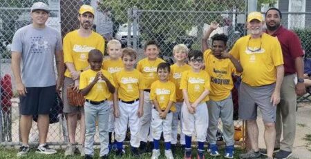 Verge in the community - Jonathan Rhodes coaches the U8 river dogs to a little league championship in 2022 in cooperation with NORD.
